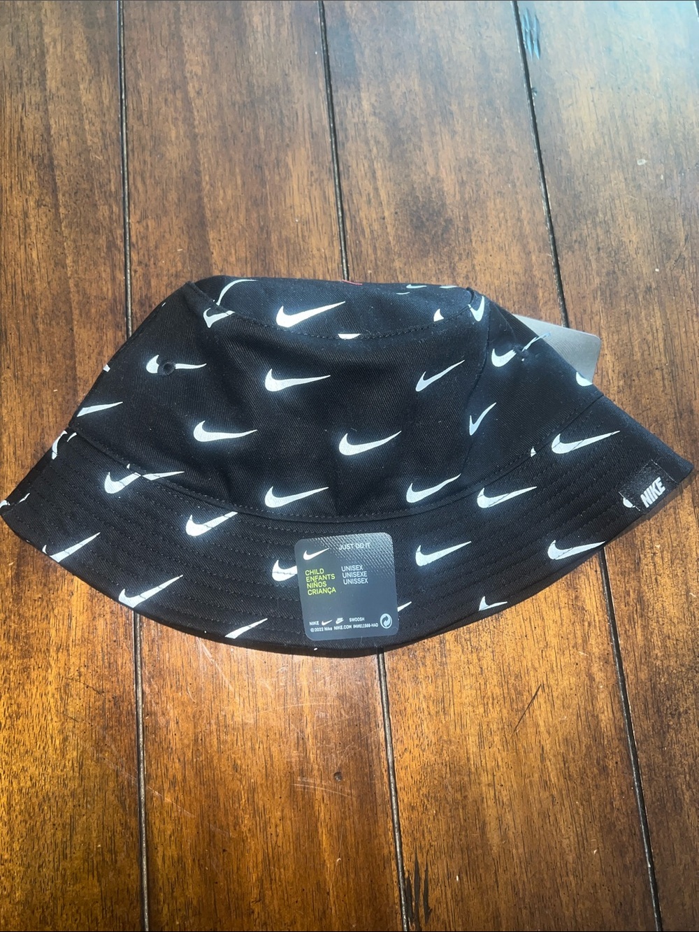 Nike Kids Black Bucket Hat with White Swoosh Print